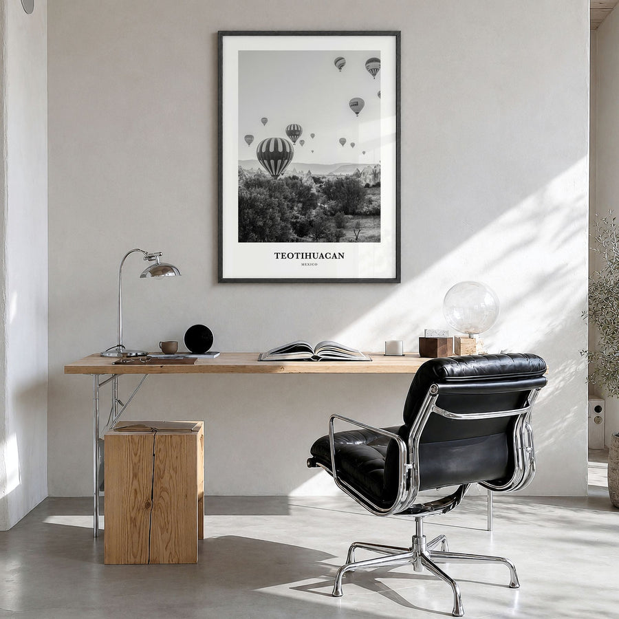 Teotihuacán Classic Poster in a black wood frame, hanging in a bright home office