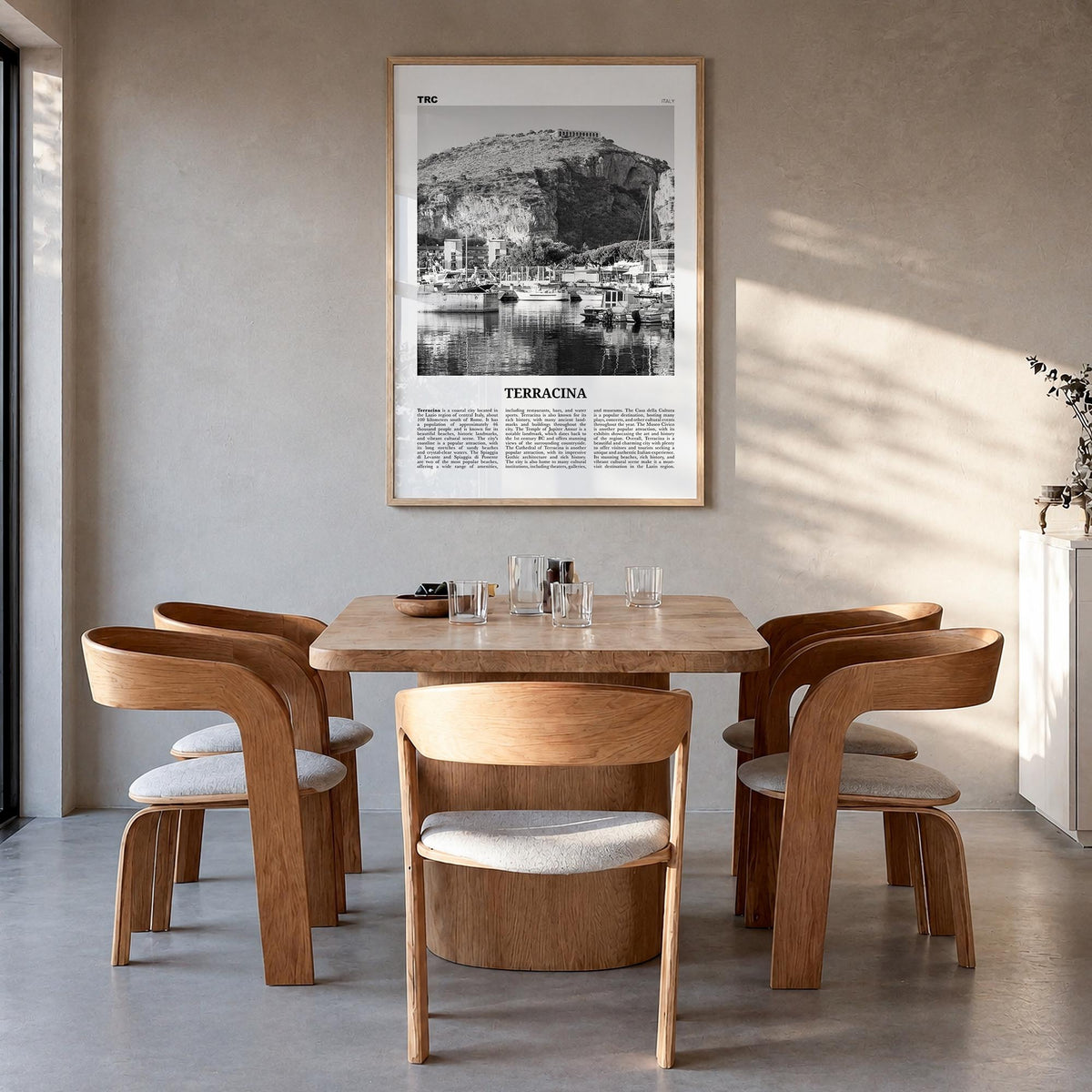 Terracina black & white newspaper poster of Italy – vertical wall art in natural wood frame, hanging on wall