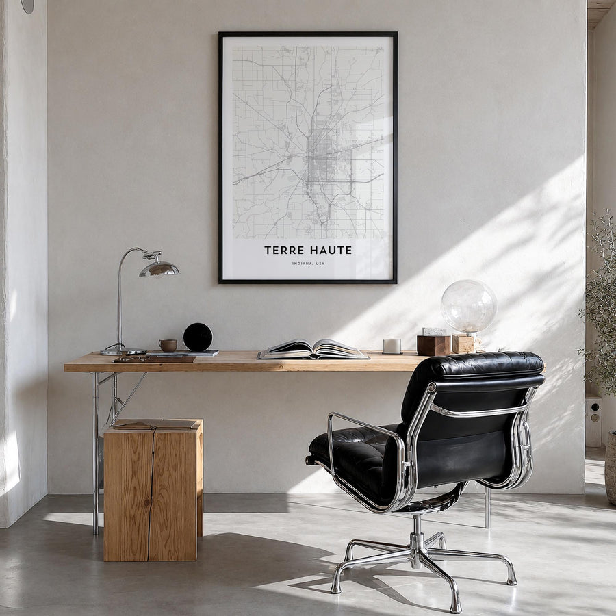 Terre Haute black & white map poster of Indiana, USA – vertical wall art in black wood frame, hanging on wall