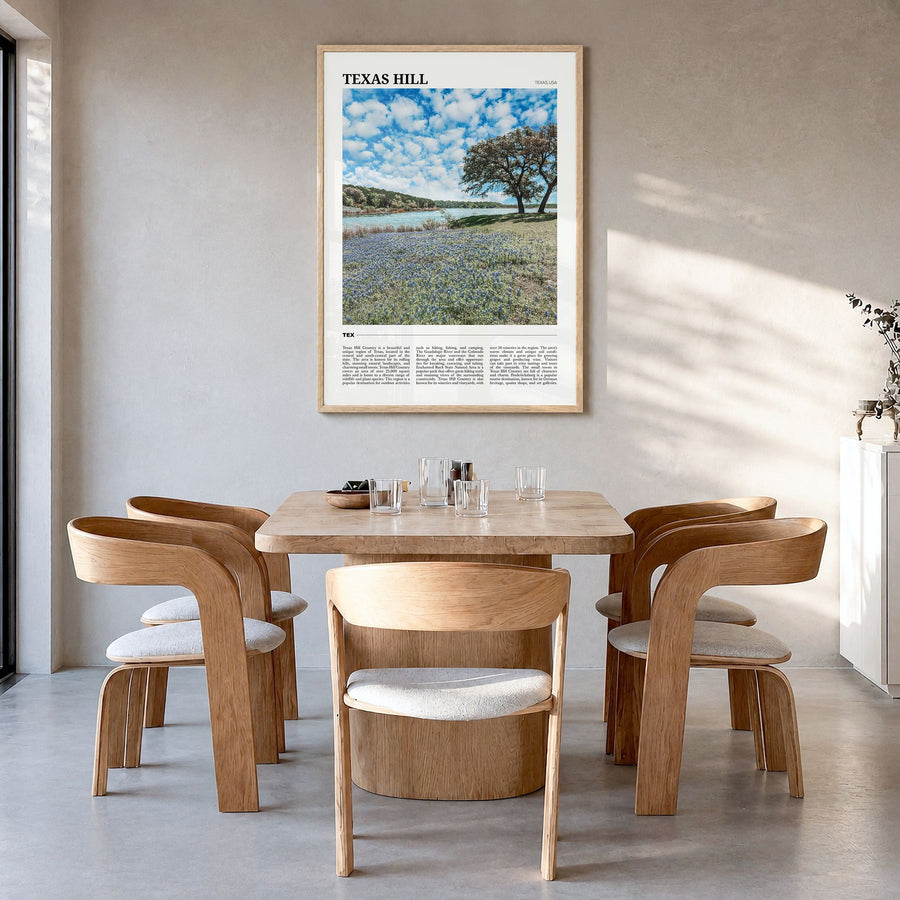Texas Hill Country Travel Poster in a natural wood frame, hanging in a dining room