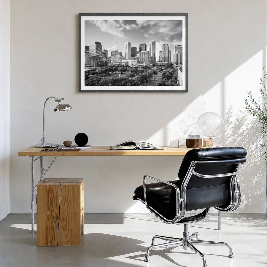 Texas Photo Poster in a black wood frame, hanging in a bright home office, white border