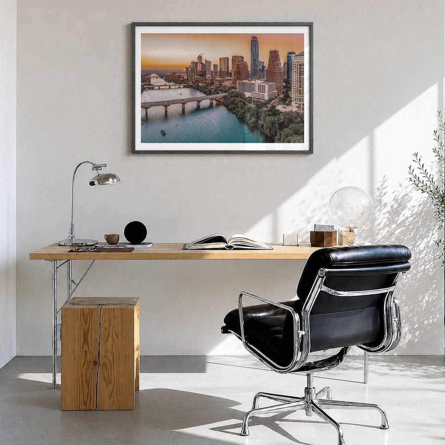 Texas Photo Poster in a black wood frame, hanging in a bright home office, white border