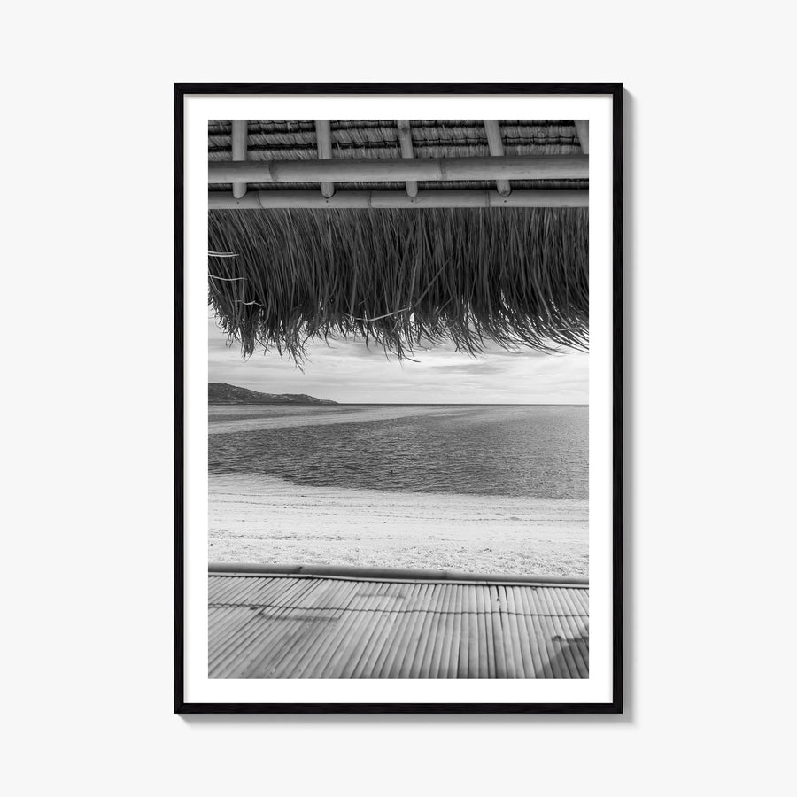 Thatched Hut no. 1 black & white photo poster – vertical wall art, unframed print shown in interior mockup
