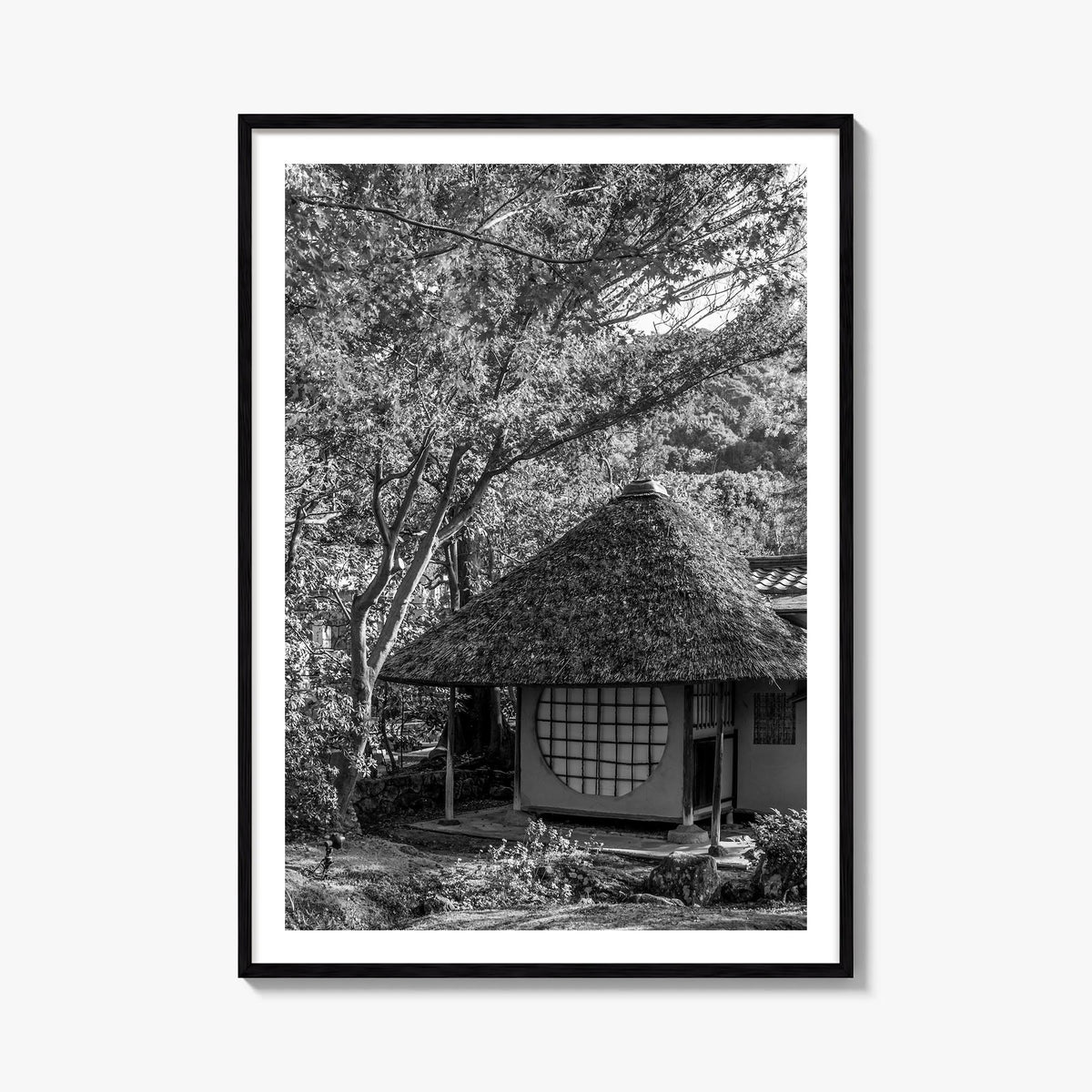 Thatched Hut no. 2 black & white photo poster – vertical wall art, unframed print shown in interior mockup