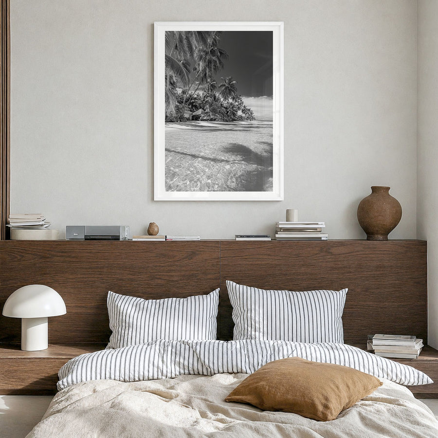 The Bahamas Photo Poster in a white wood frame, hanging in a bedroom, white border