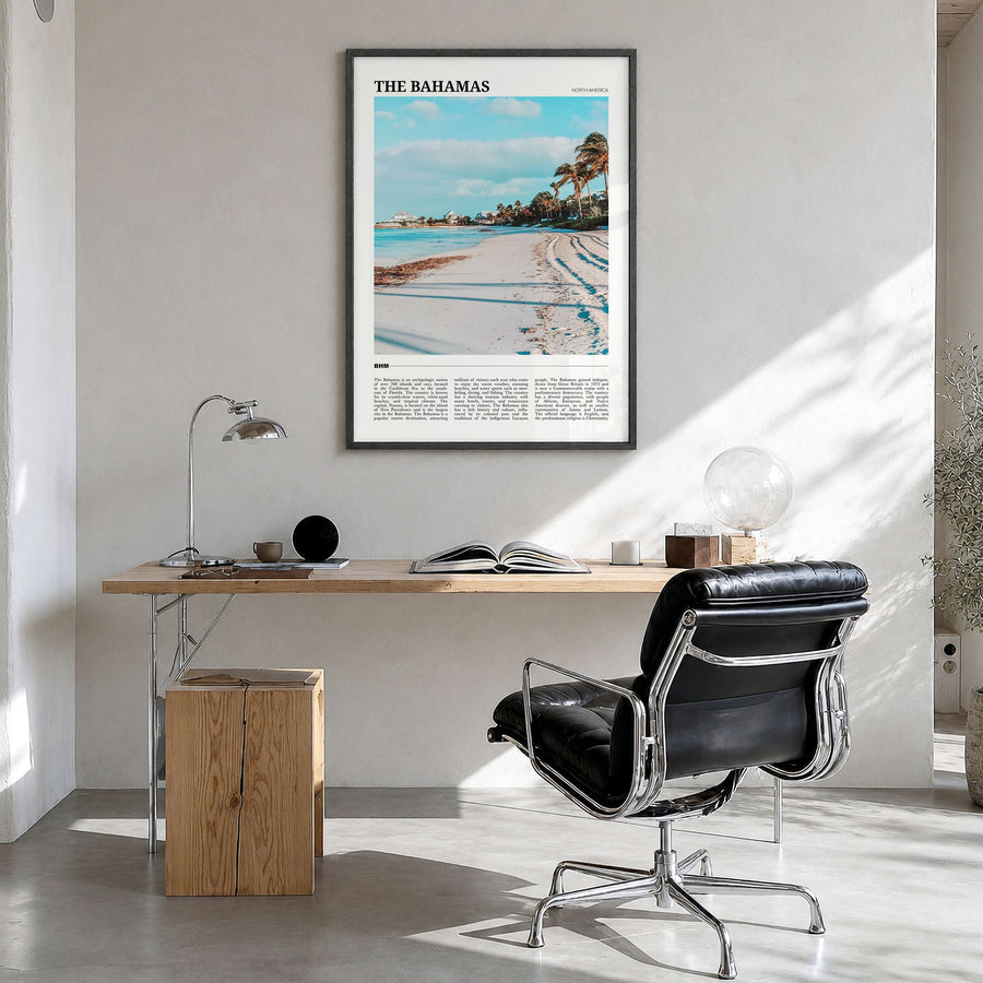 The Bahamas Travel Poster in a black wood frame, hanging in a bright home office