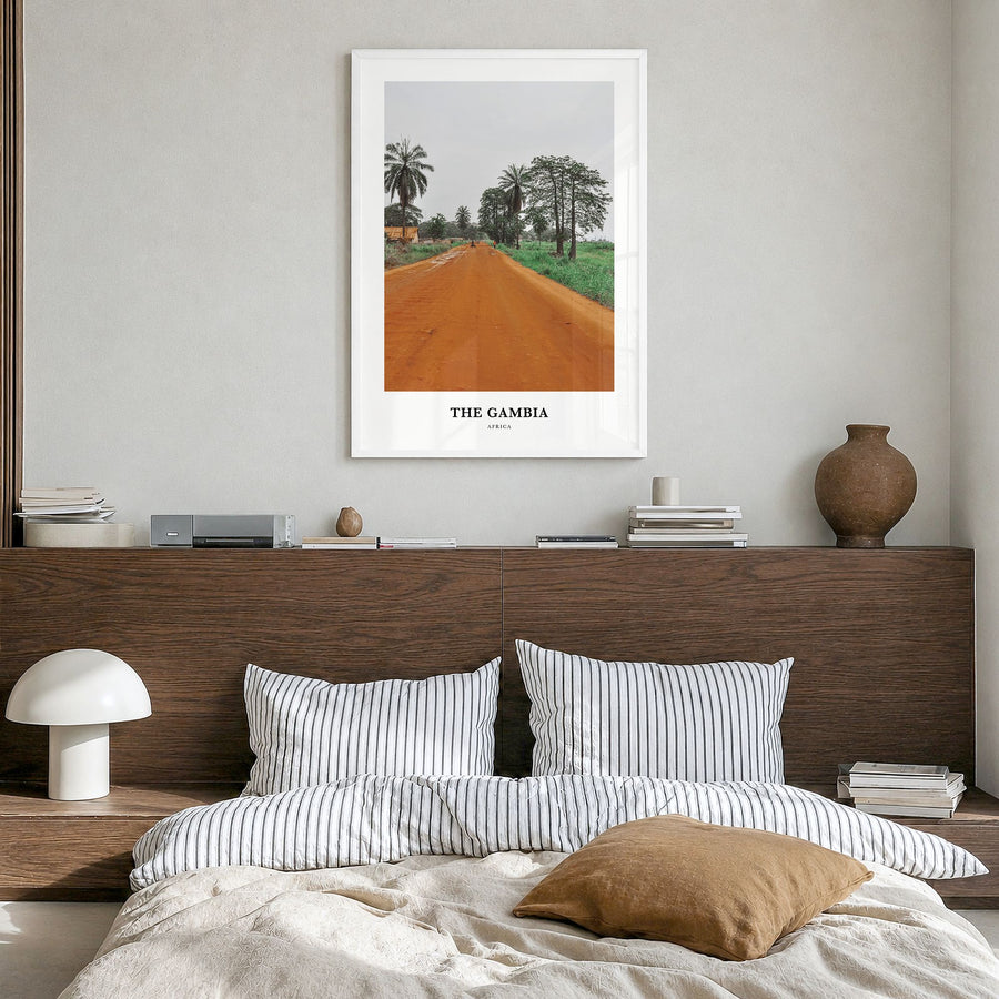 The Gambia Classic Poster in a white wood frame, hanging in a bedroom
