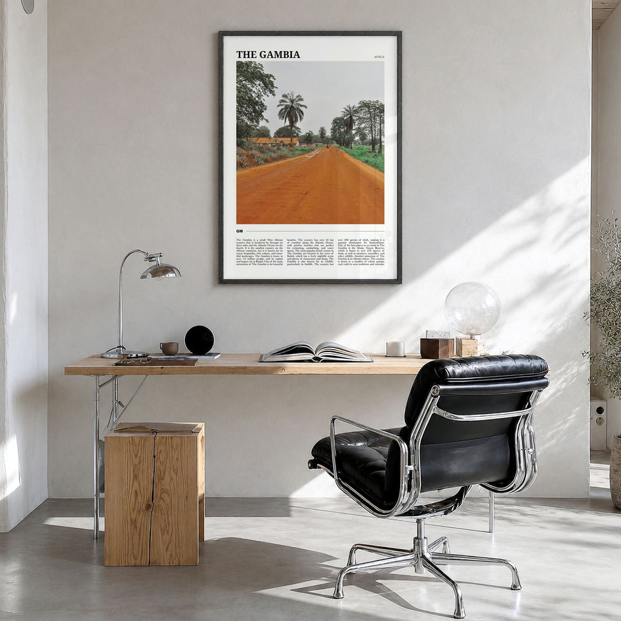 The Gambia Travel Poster in a black wood frame, hanging in a bright home office