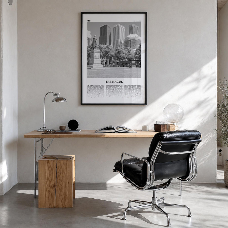 The Hague black & white newspaper poster of Netherlands – vertical wall art in black wood frame, hanging on wall