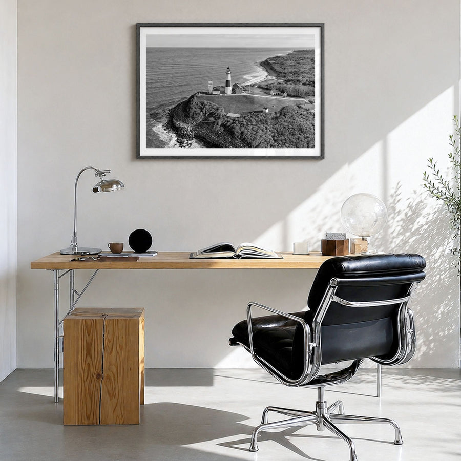 The Hamptons Photo Poster in a black wood frame, hanging in a bright home office, white border