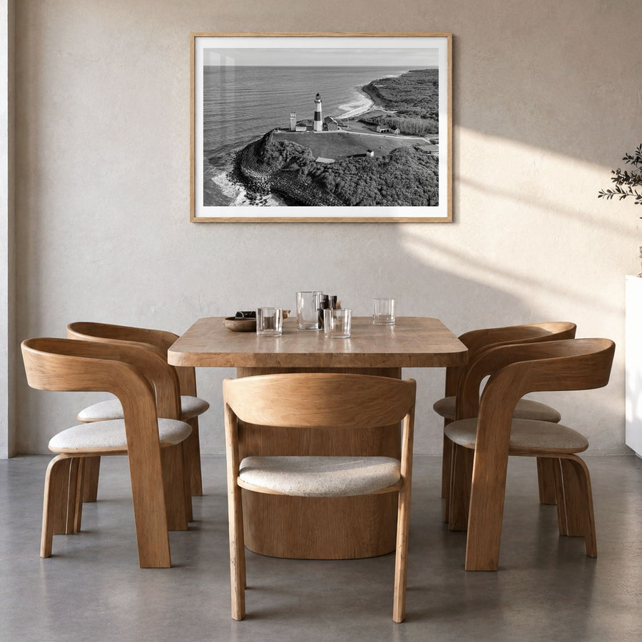 The Hamptons Photo Poster in a natural wood frame, hanging in a dining room, white border