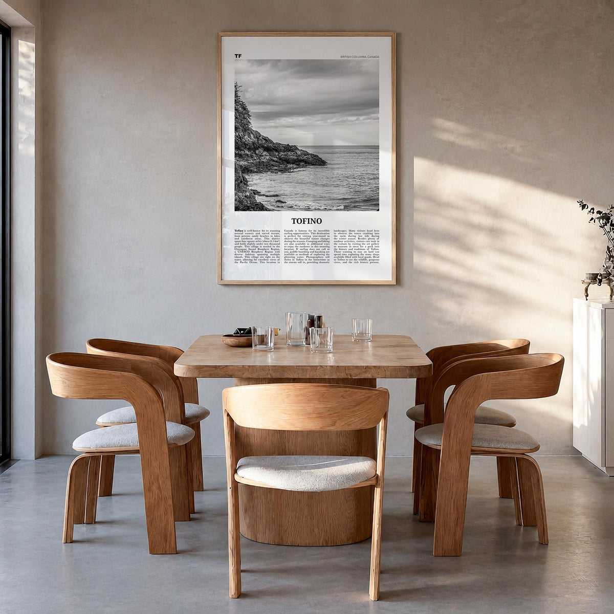 Tofino black & white newspaper poster of British Columbia, Canada – vertical wall art in natural wood frame, hanging on wall