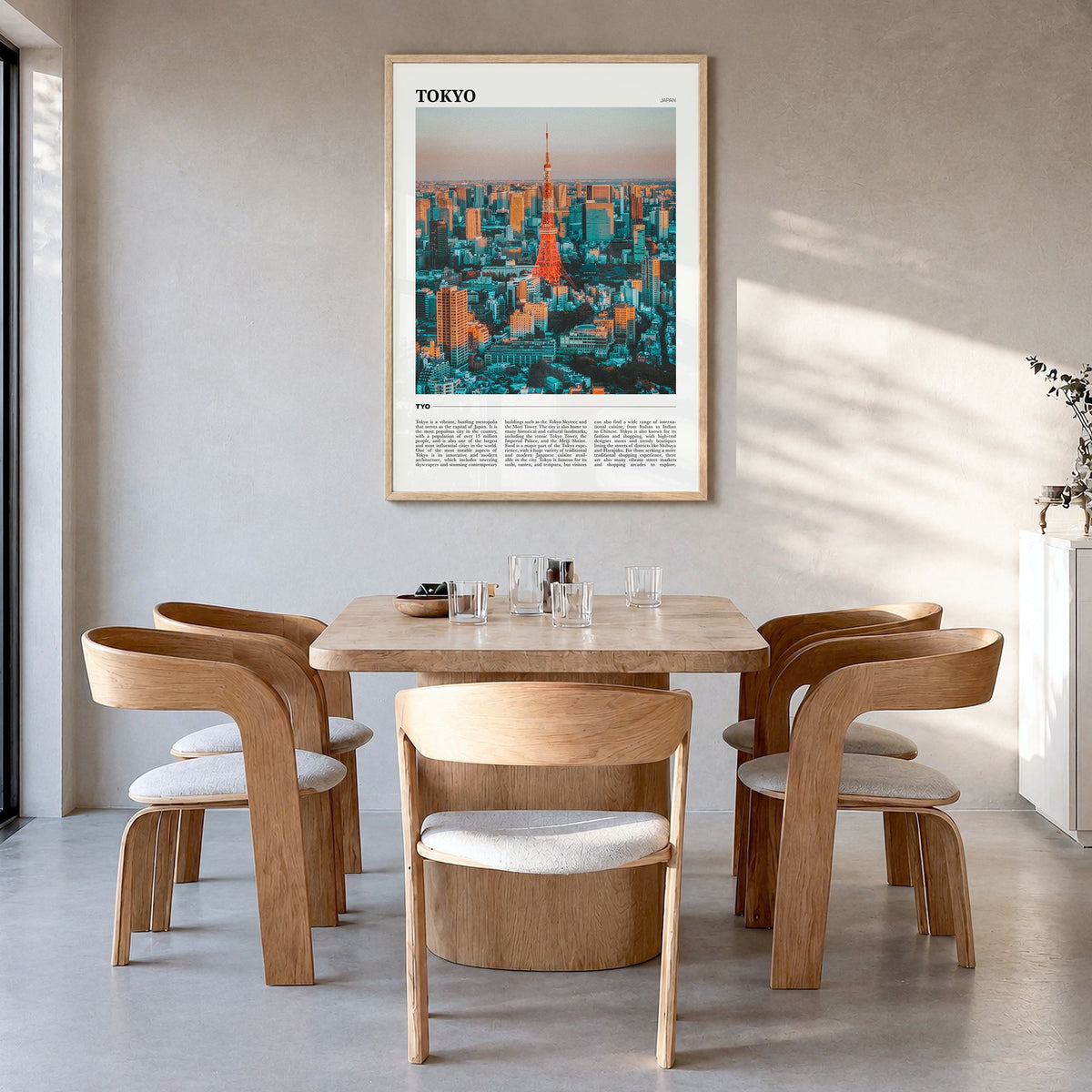 Tokyo Travel Poster in a natural wood frame, hanging in a dining room