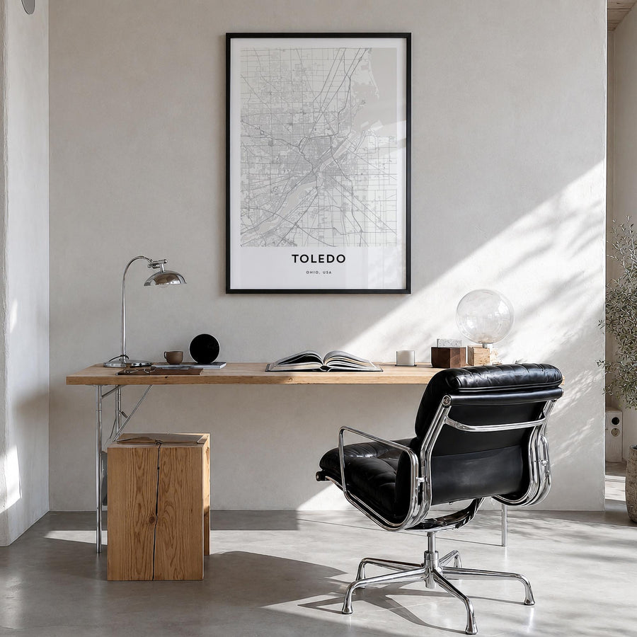 Toledo, Ohio black & white map poster of Ohio, USA – vertical wall art in black wood frame, hanging on wall