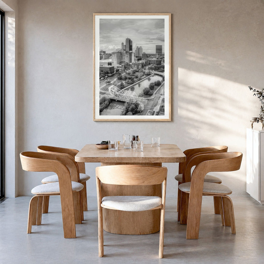 Toledo, Ohio Photo Poster in a natural wood frame, hanging in a dining room, white border