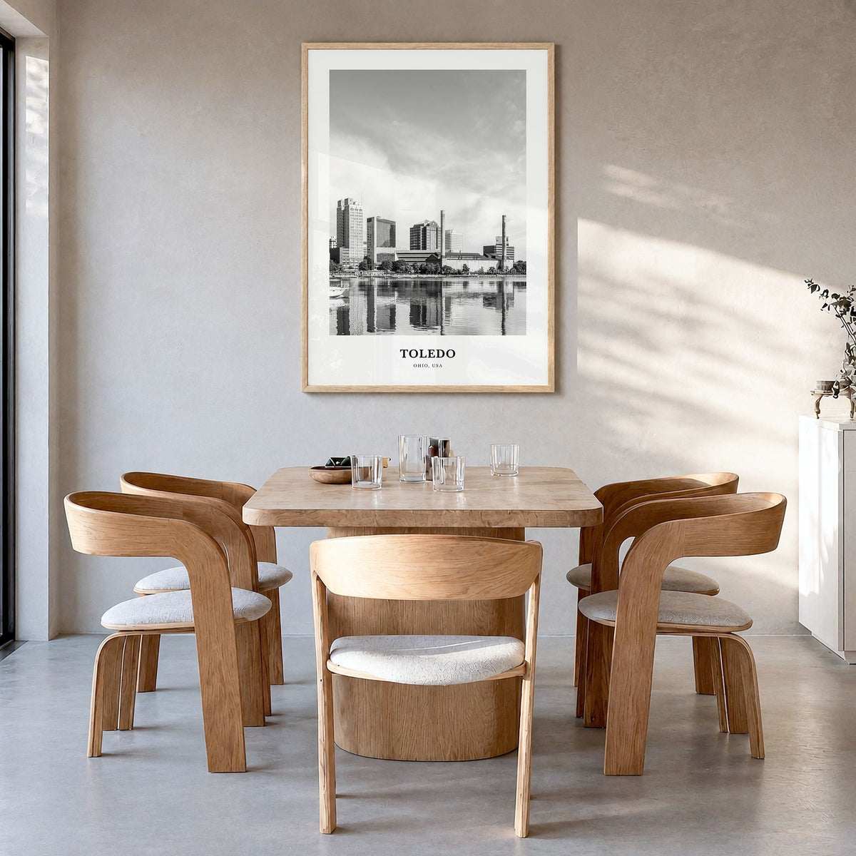 Toledo, Ohio Classic Poster in a natural wood frame, hanging in a dining room