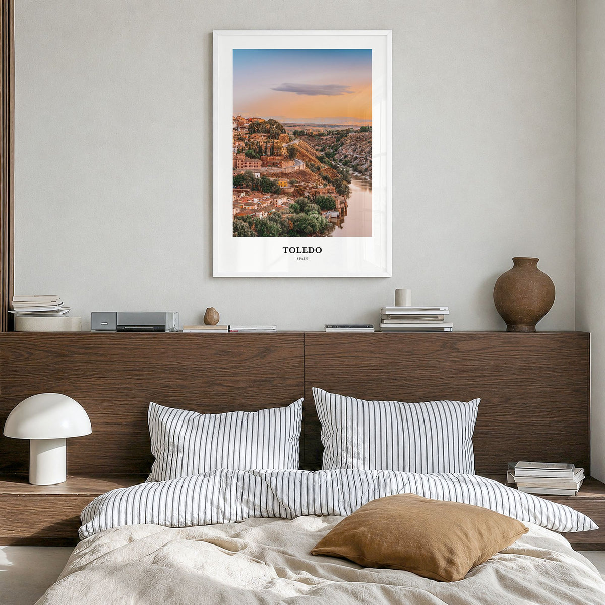 Toledo, Spain Classic Poster in a white wood frame, hanging in a bedroom