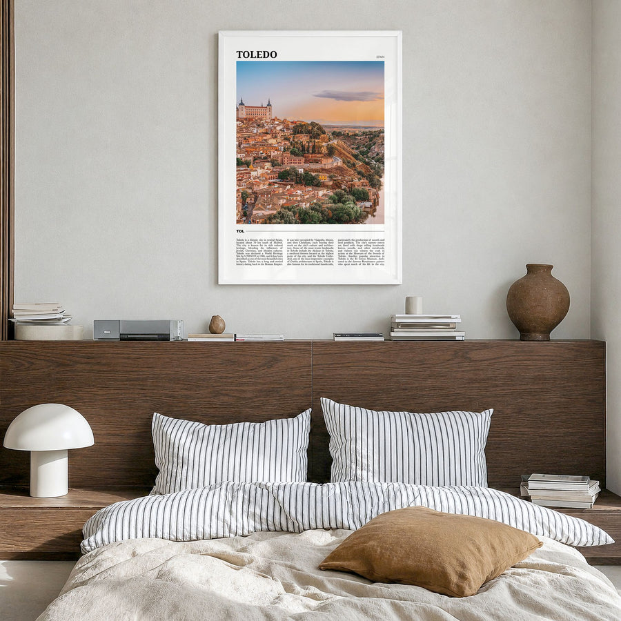 Toledo, Spain Travel Poster in a white wood frame, hanging in a bedroom