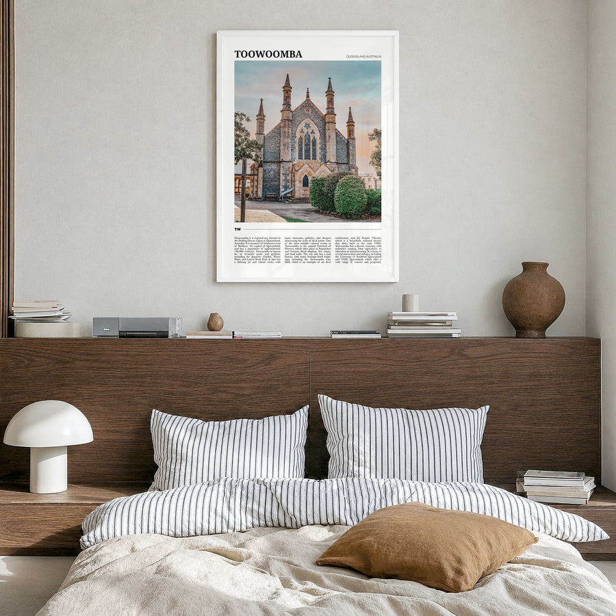 Toowoomba Travel Poster in a white wood frame, hanging in a bedroom