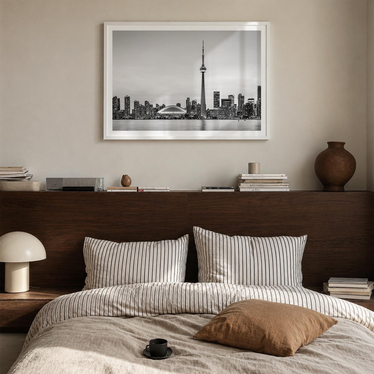 Toronto black & white photo poster of Ontario, Canada – horizontal wall art in white wood frame with white border, hanging on