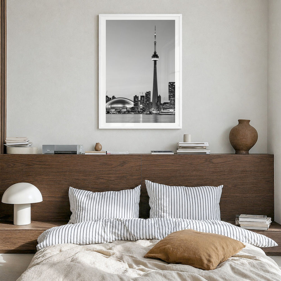 Toronto Photo No 2 Poster in a white wood frame, hanging in a bedroom, white border