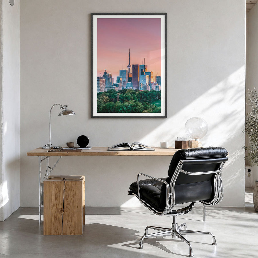 Toronto Photo No 1 Poster in a black wood frame, hanging in a bright home office, white border