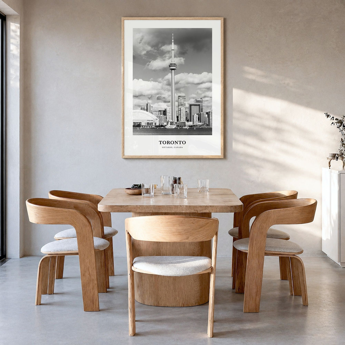 Toronto Classic No 3 Poster in a natural wood frame, hanging in a dining room