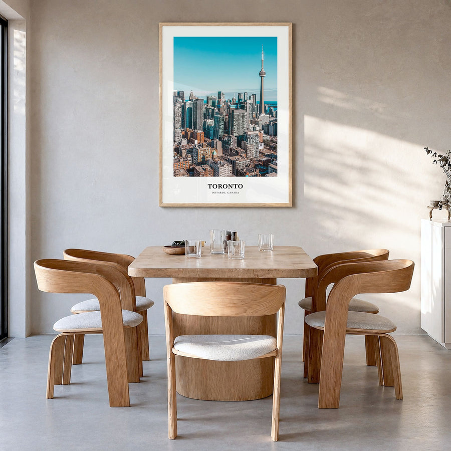 Toronto Classic Poster in a natural wood frame, hanging in a dining room