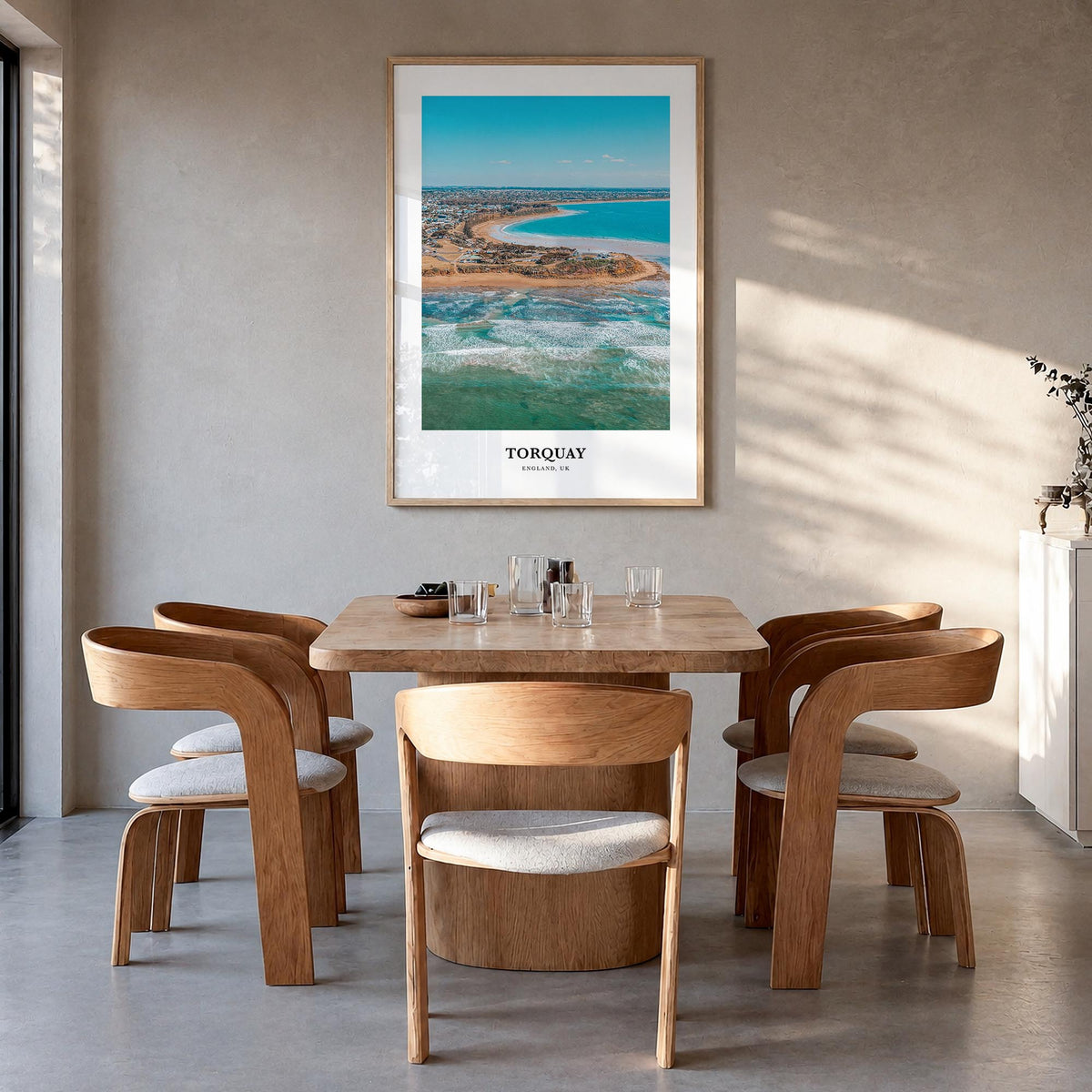 Torquay colorful classic poster of United Kingdom – vertical wall art in natural wood frame, hanging on wall