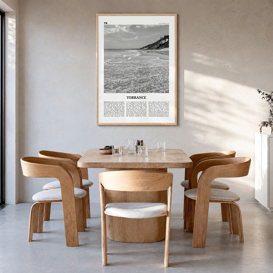 Torrance Newspaper Poster in a natural wood frame, hanging in a dining room