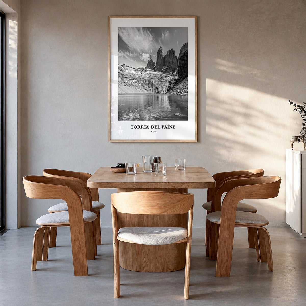 Torres del Paine black & white classic poster of Chile – vertical wall art in natural wood frame, hanging on wall