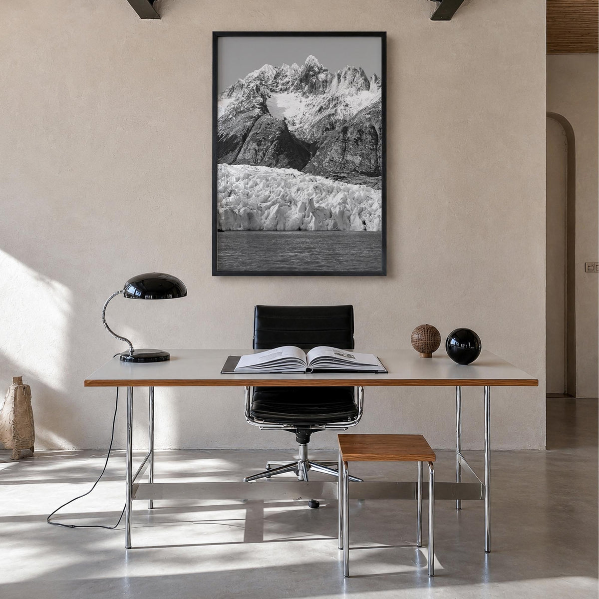 Torres del Paine black & white photo poster of Chile – vertical wall art in black wood frame, hanging on wall