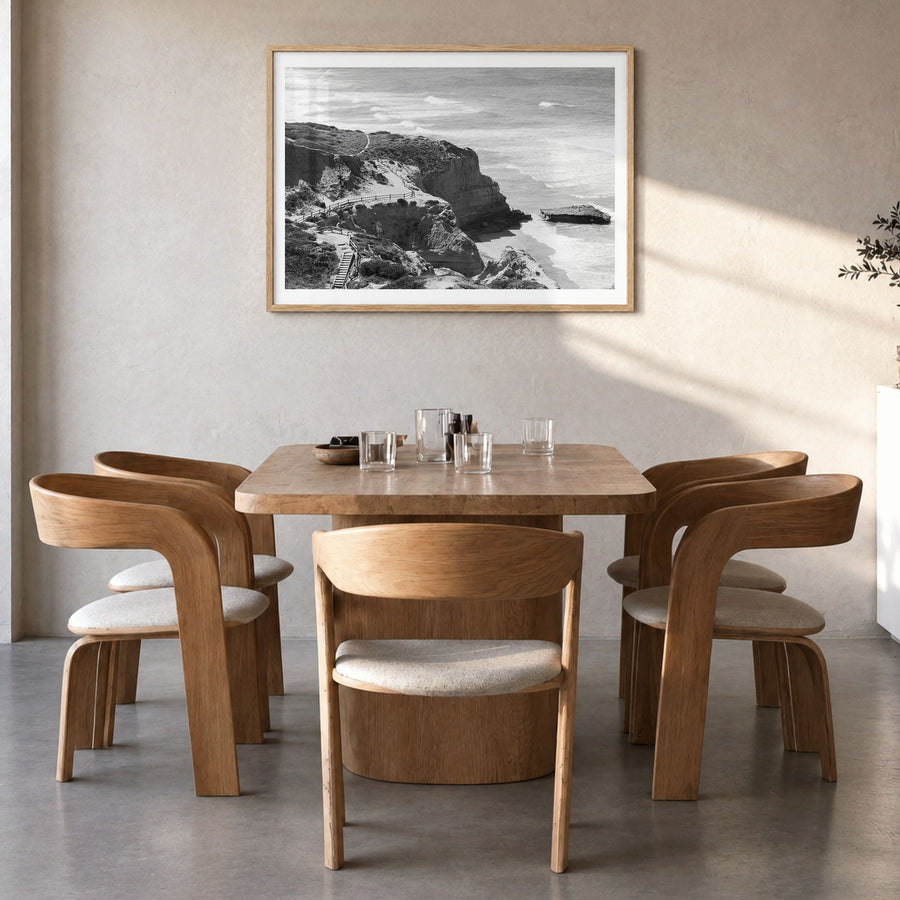 Torrey Pines Photo Poster in a natural wood frame, hanging in a dining room, white border