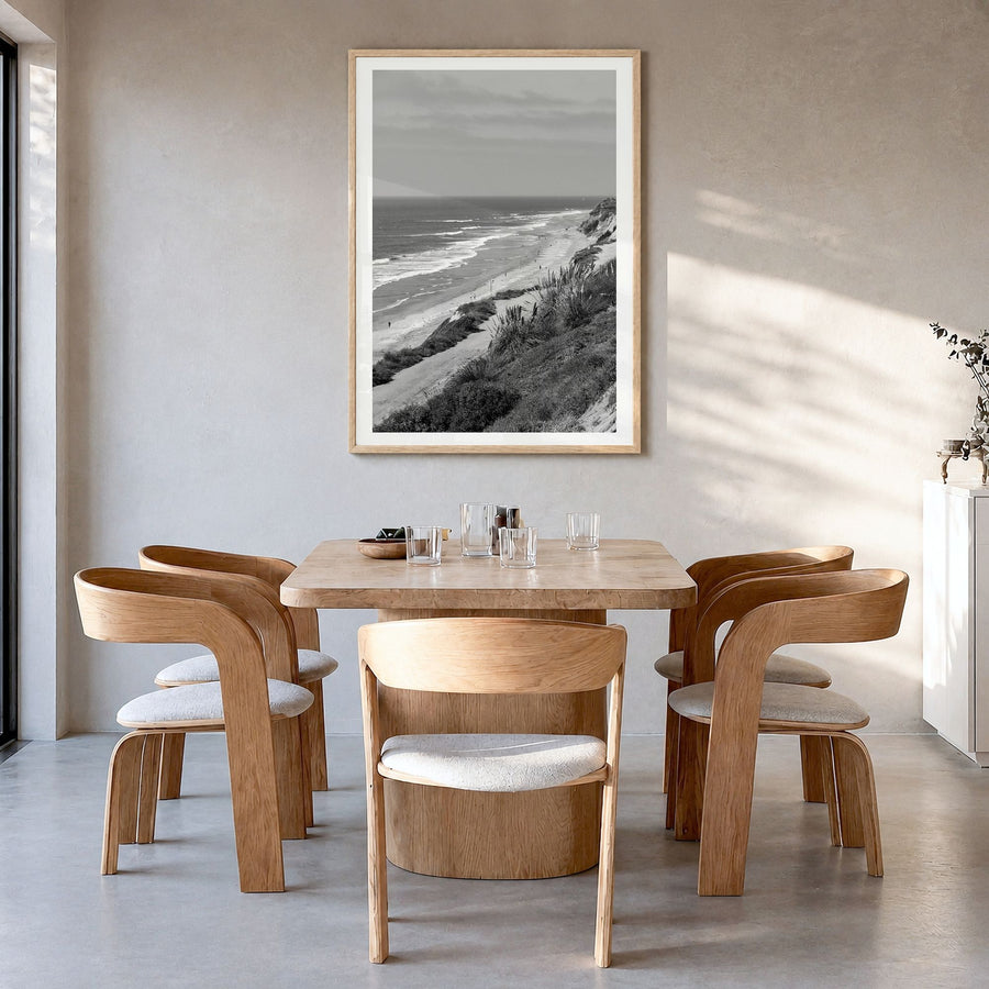 Torrey Pines Photo Poster in a natural wood frame, hanging in a dining room, white border