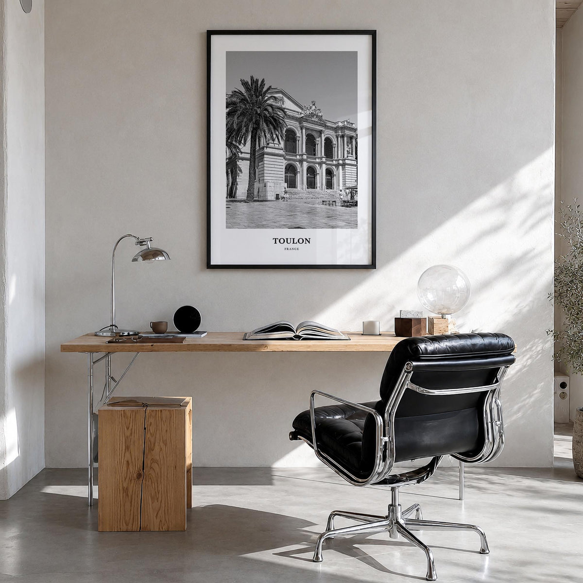 Toulon black & white classic poster of France – vertical wall art in black wood frame, hanging on wall