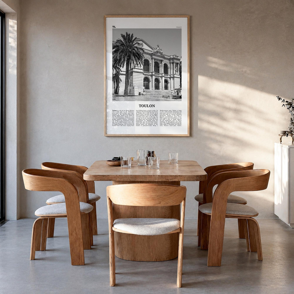 Toulon black & white newspaper poster of France – vertical wall art in natural wood frame, hanging on wall