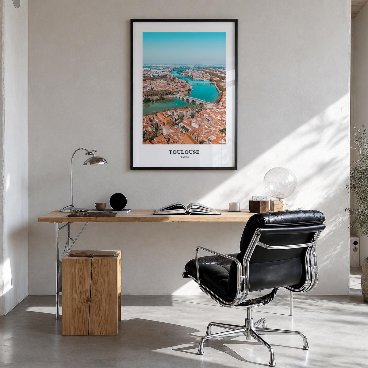Toulouse colorful classic poster of France – vertical wall art in black wood frame, hanging on wall