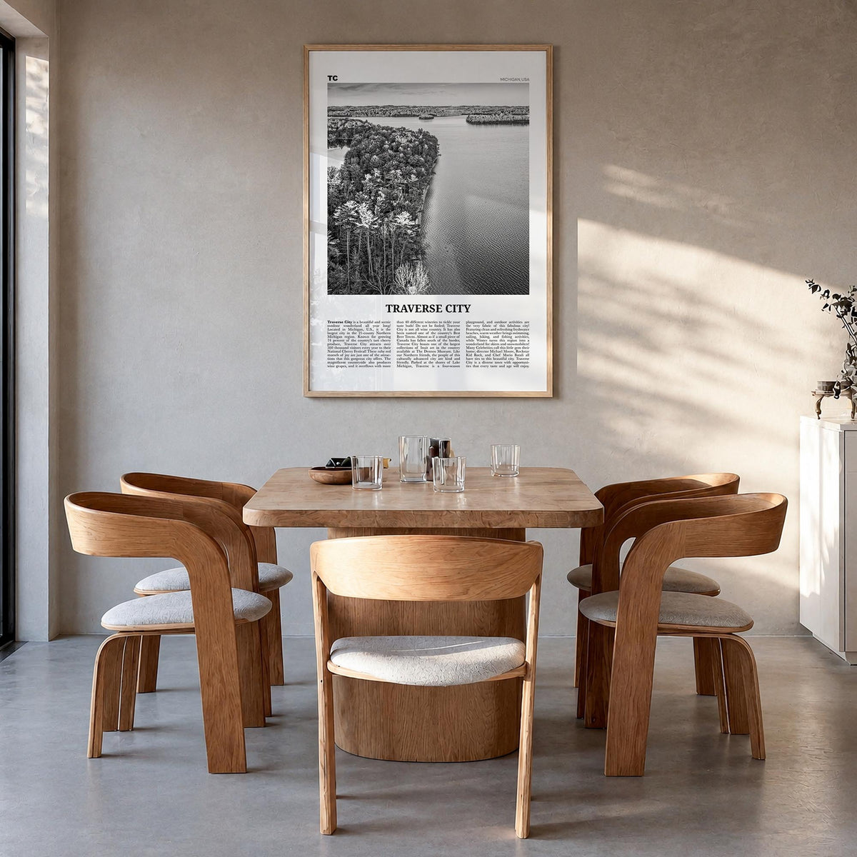 Traverse City black & white newspaper poster of Michigan, USA – vertical wall art in natural wood frame, hanging on wall