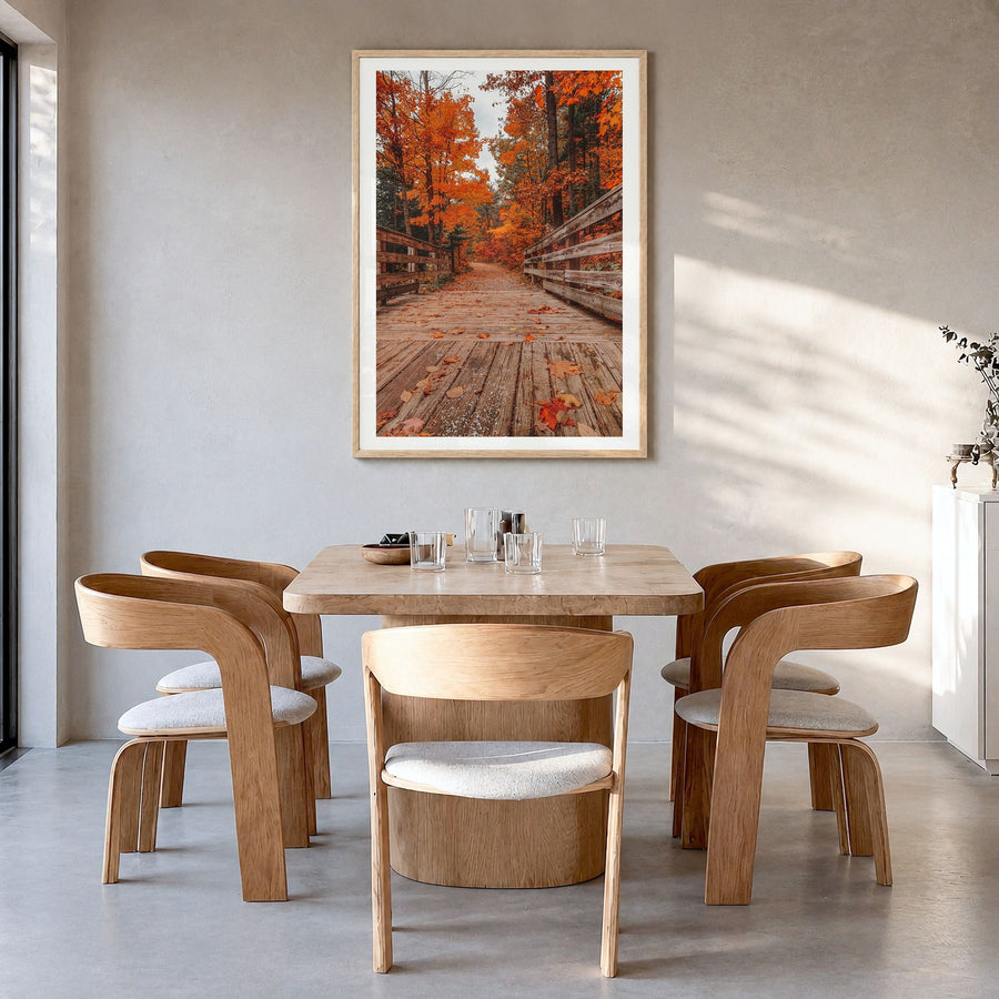 Traverse City Photo No 2 Poster in a natural wood frame, hanging in a dining room, white border