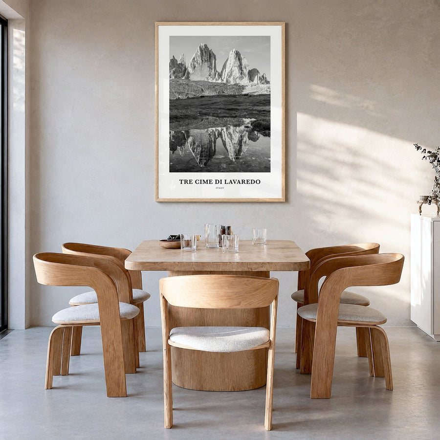 Tre Cime di Lavaredo Classic Poster in a natural wood frame, hanging in a dining room