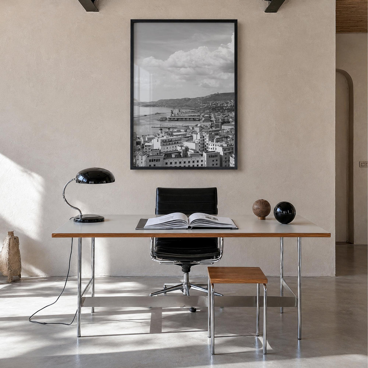 Trieste black & white photo poster of Italy – vertical wall art in black wood frame, hanging on wall