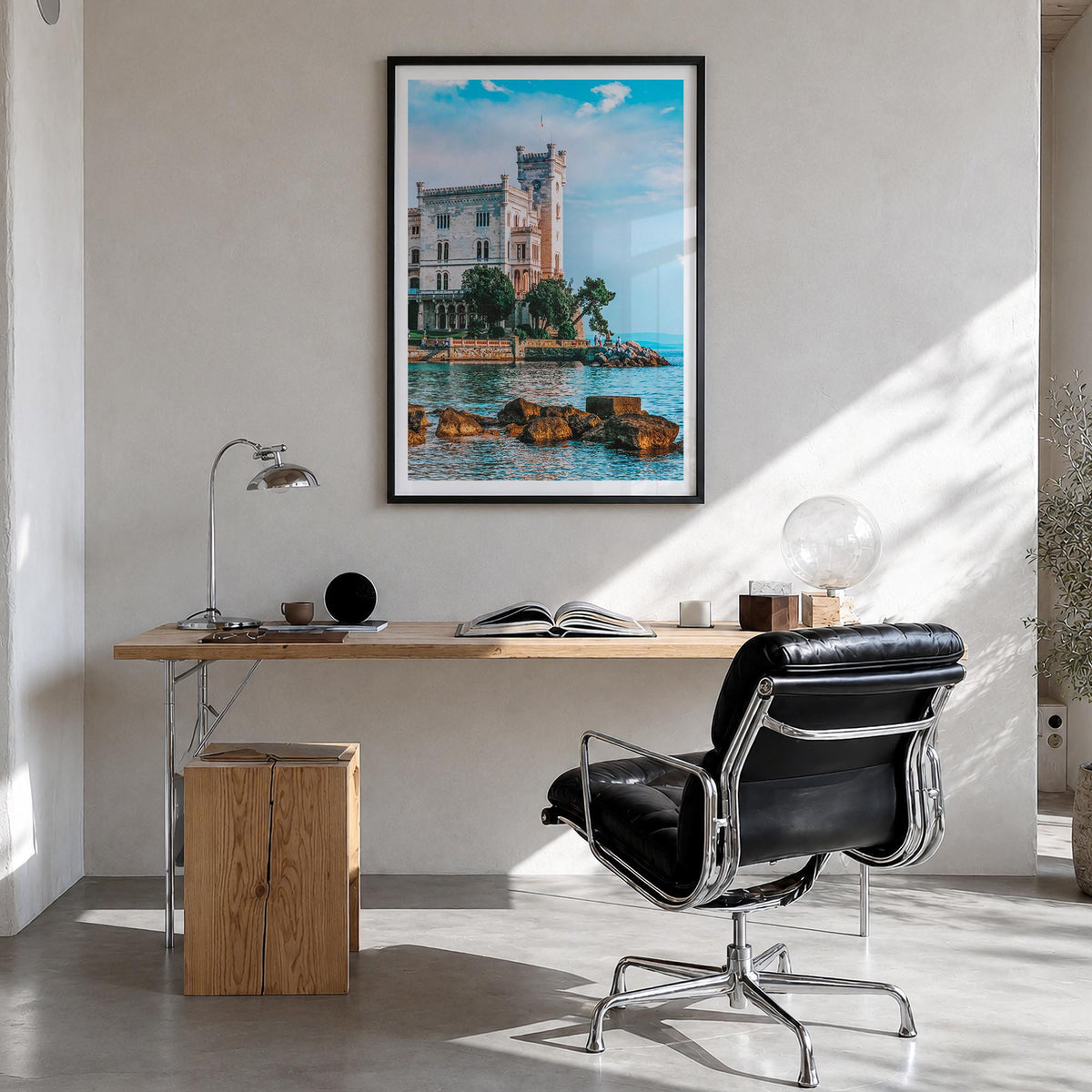 Trieste colorful photo poster of Italy – vertical wall art in black wood frame with white border, hanging on wall