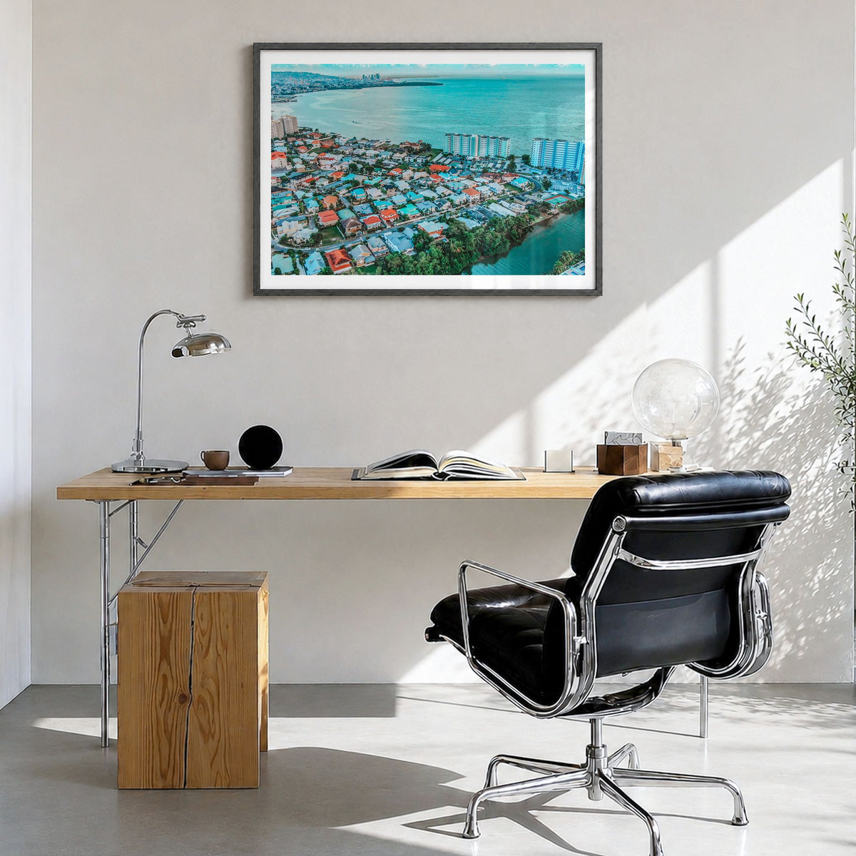 Trinidad and Tobago Photo Poster in a black wood frame, hanging in a bright home office, white border