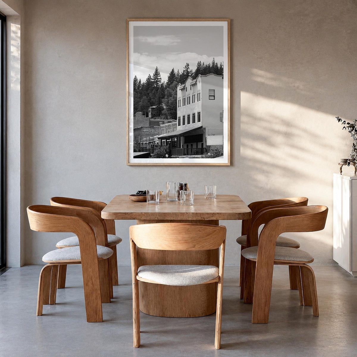 Truckee black & white photo poster of California, USA – vertical wall art in natural wood frame with white border, hanging on