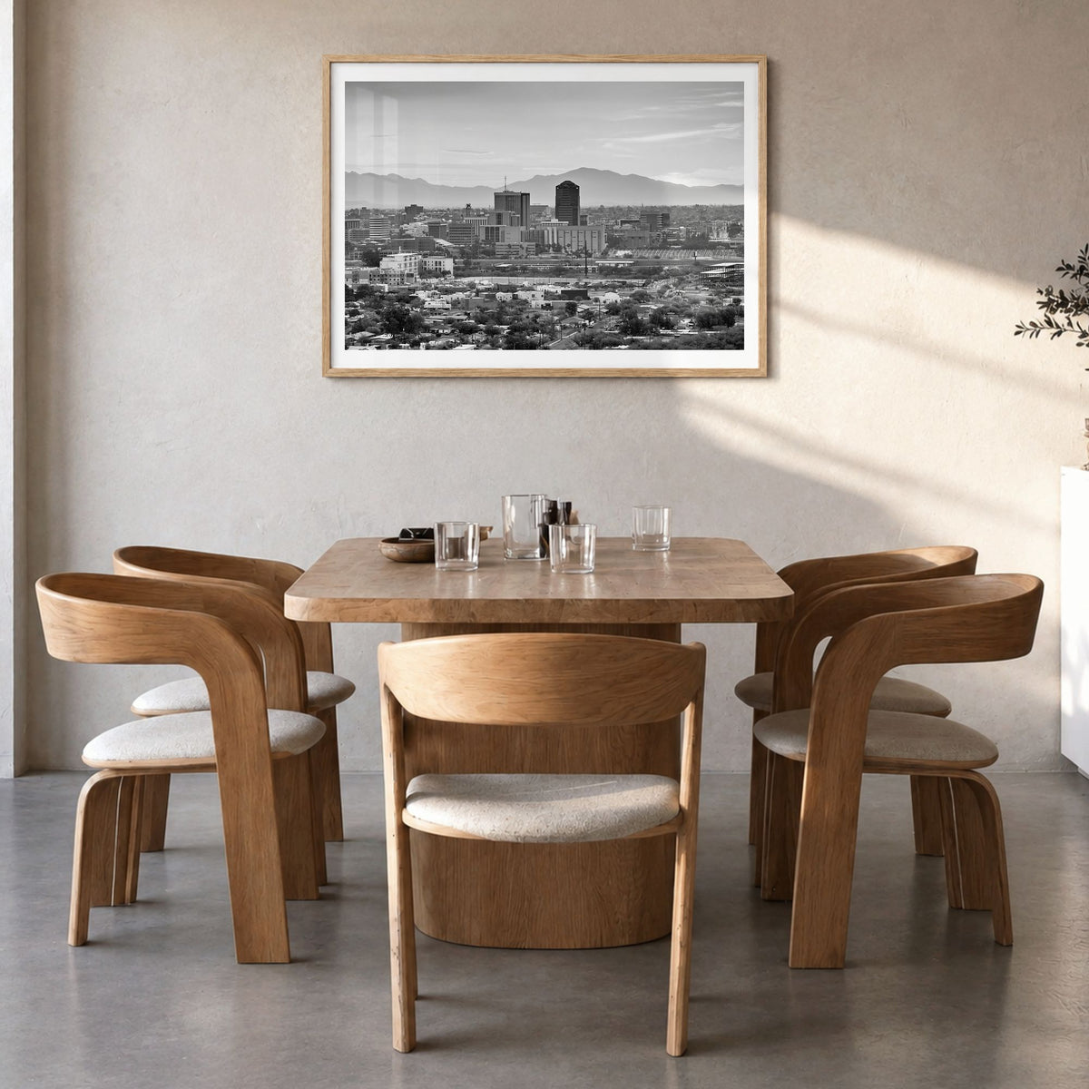 Tucson Photo Poster in a natural wood frame, hanging in a dining room, white border