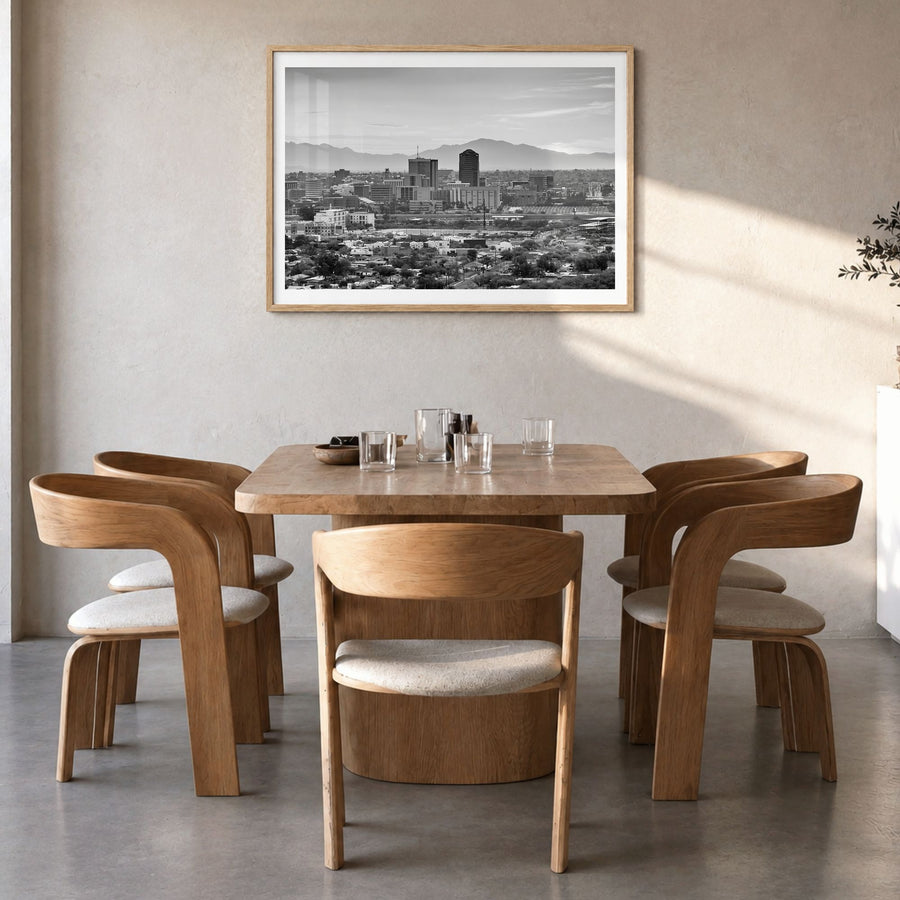 Tucson Photo Poster in a natural wood frame, hanging in a dining room, white border