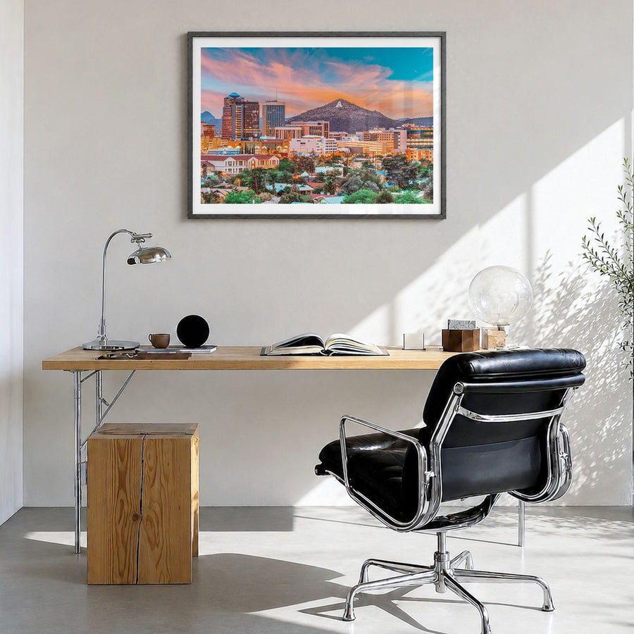Tucson Photo Poster in a black wood frame, hanging in a bright home office, white border