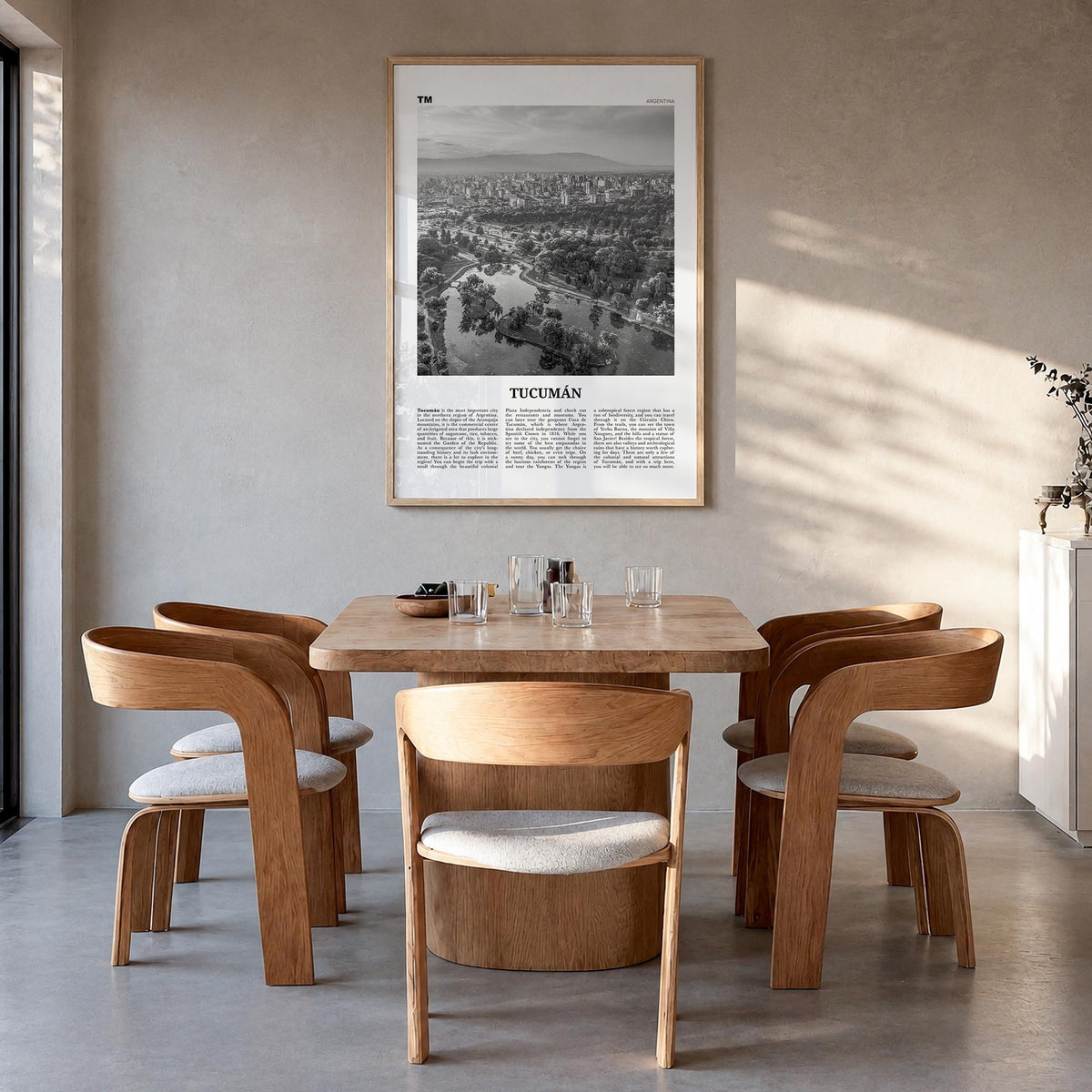 Tucumán black & white newspaper poster of Argentina – vertical wall art in natural wood frame, hanging on wall