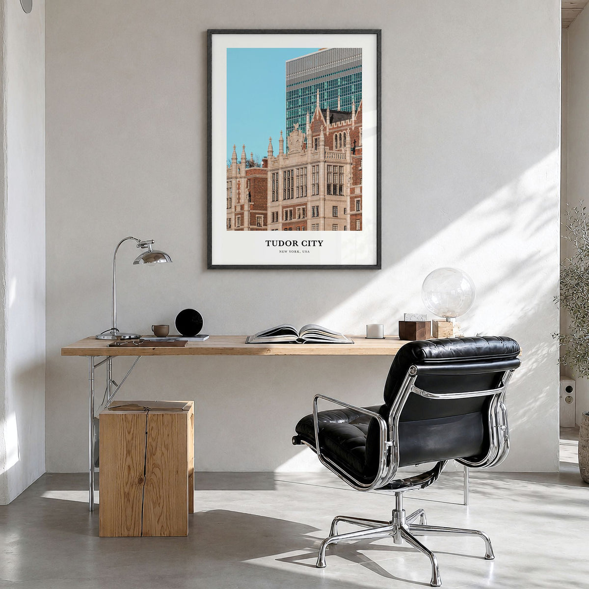 Tudor City Classic Poster in a black wood frame, hanging in a bright home office