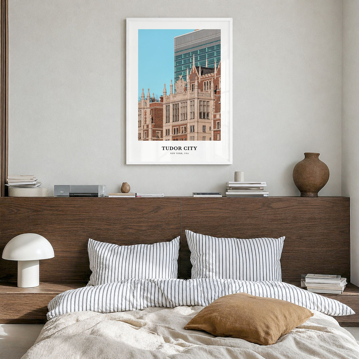 Tudor City Classic Poster in a white wood frame, hanging in a bedroom